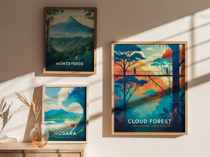 Three framed posters are displayed on a wall, featuring colorful illustrations of Monteverde, Nosara, and a cloud forest canopy walkway. Sunlight casts shadows across the wall.