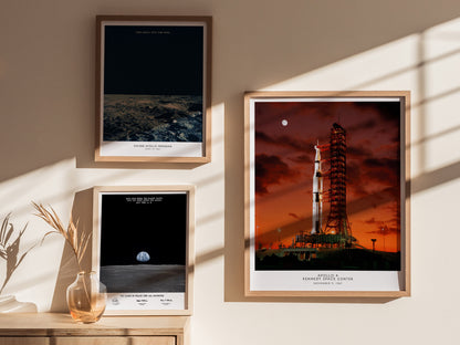Gallery wall featuring the Apollo 4 launch poster paired with other Apollo and Saturn V NASA prints