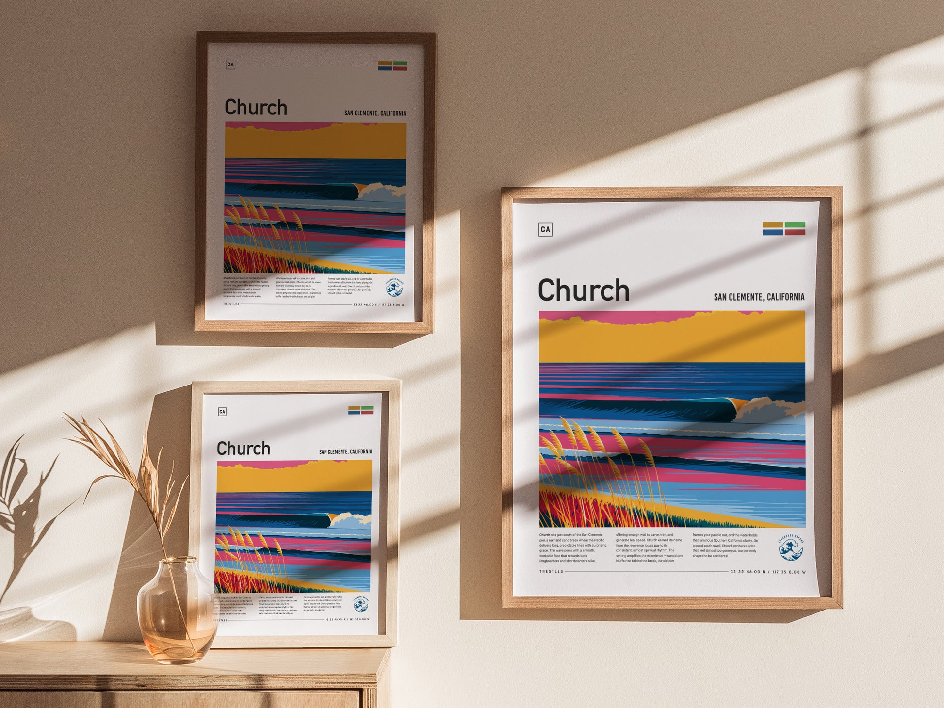 Three framed posters titled Church are displayed on a wall, showcasing vibrant illustrations of waves and colorful landscapes.
