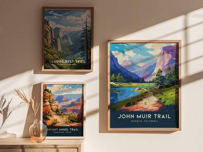 Three framed posters are displayed on a sunlit wall, featuring scenic trails: Clouds Rest Trail, Bright Angel Trail, and John Muir Trail, each with vibrant landscapes.