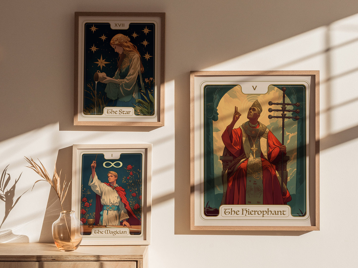 Three framed tarot card posters are displayed on a wall. The Hierophant card shows a robed figure holding a staff, with The Star and The Magician cards nearby.