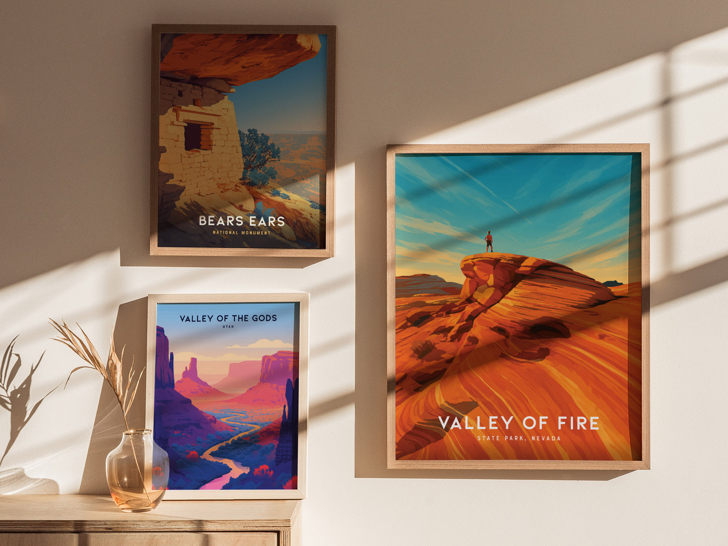 Framed Valley of Fire Nevada poster showcasing vibrant red rock formations, a figure atop a rock, and a stunning sunset sky.