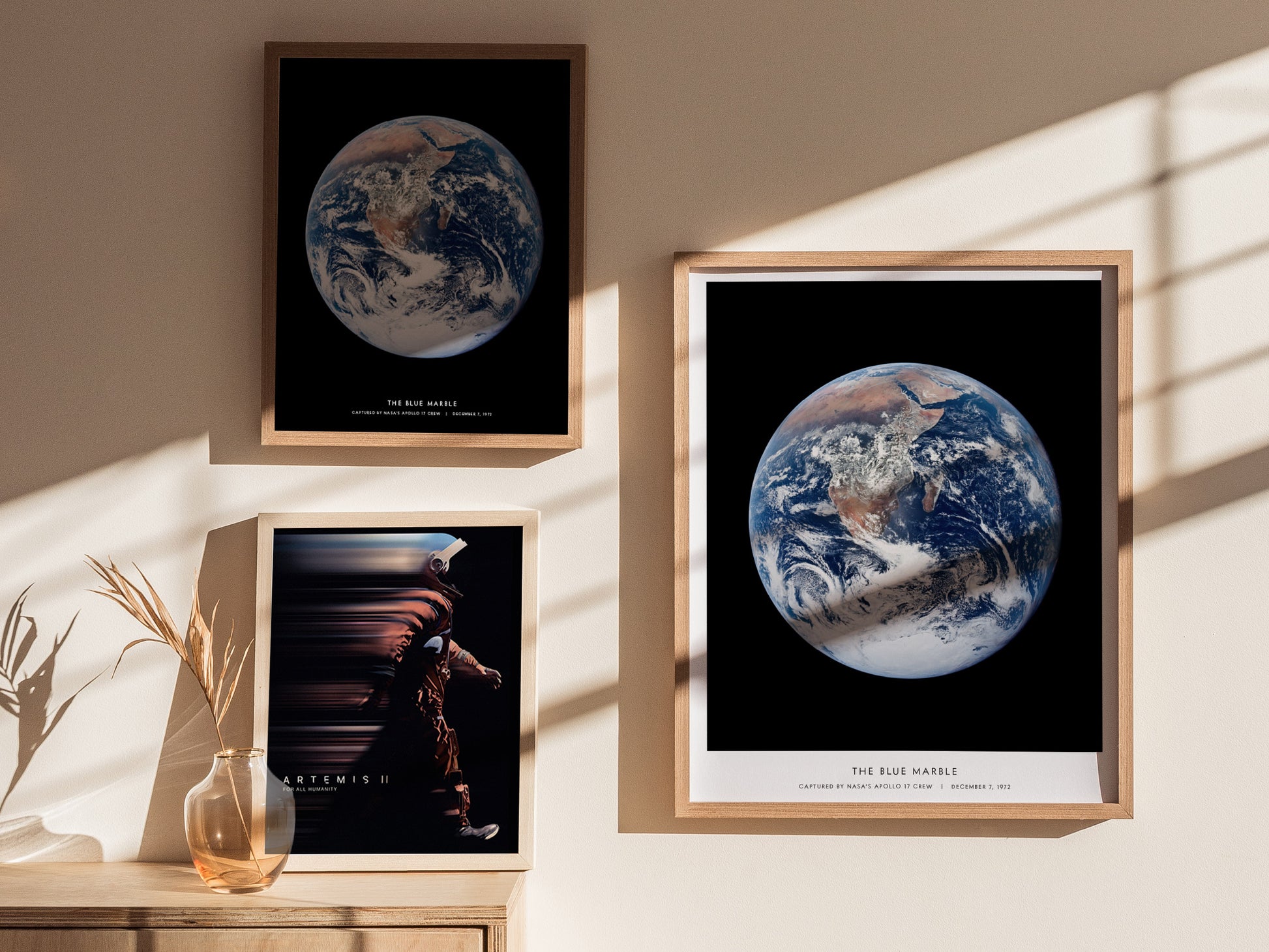 Gallery wall featuring the Blue Marble Earth poster paired with other NASA space and planet prints