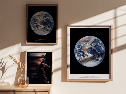 Gallery wall featuring the Blue Marble Earth poster paired with other NASA space and planet prints