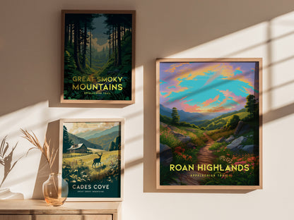 Three framed posters are displayed on a wall, showcasing landscapes of Roan Highlands, Great Smoky Mountains, and Cades Cove, with sunlight casting shadows across them.