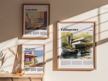 Three framed posters are displayed on a sunlit wall, featuring watercolor illustrations of iconic Frank Lloyd Wright buildings: Fallingwater, Guggenheim, and Taliesin West. A vase with dried plants sits nearby.