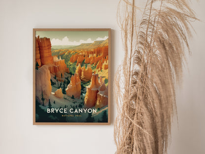 Framed artwork of Bryce Canyon National Park featuring vibrant orange and red hoodoos, displayed on a light-colored wall next to tall, dried pampas grass.