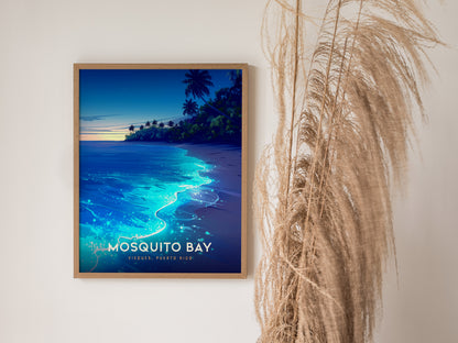 Framed poster of Mosquito Bay in Vieques, showcasing glowing blue bioluminescent waves and silhouetted palm trees at dusk.