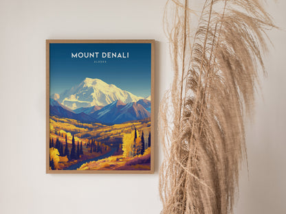 A framed Mount Denali poster features a colorful landscape of mountains and trees, with pampas grass decor on the right. The poster has a vibrant, artistic design.