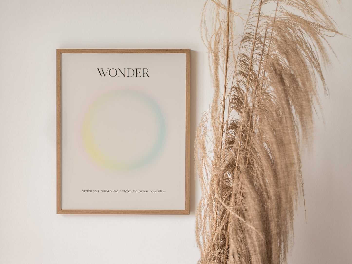Framed "WONDER" pastel gradient minimalist print by Swell Scenes, featuring calming hues and elegant typography for travel art decor.