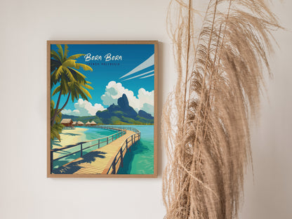 A framed travel print of Bora Bora hangs on a wall, depicting turquoise waters, palm trees, and overwater bungalows, with dried pampas grass nearby.