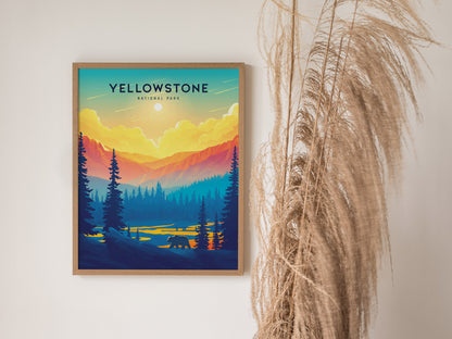 A framed poster of Yellowstone National Park depicts a vibrant sunset with mountains, trees, and a bear silhouette. Tall, dried plants are visible beside the poster.