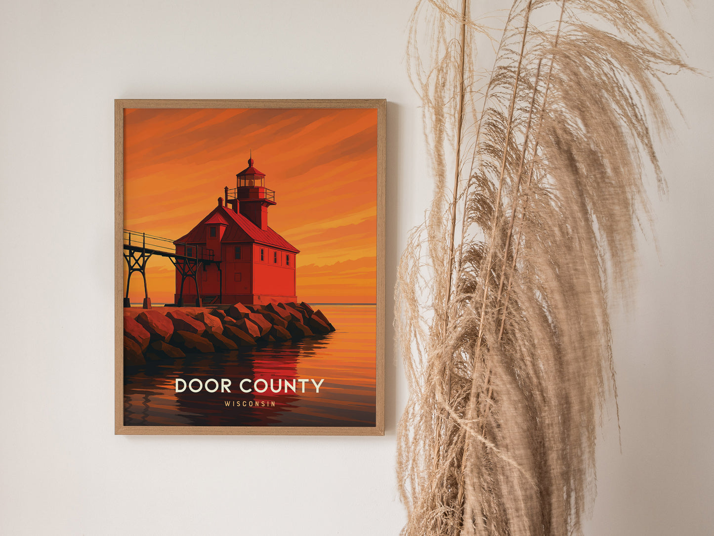 Framed vintage Door County art print showcasing a red lighthouse at sunset, with warm orange skies and serene waters.