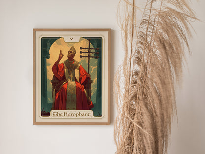 Framed Hierophant Tarot card poster featuring a spiritual figure in red robes enthroned, set against a light wall with dried pampas grass.