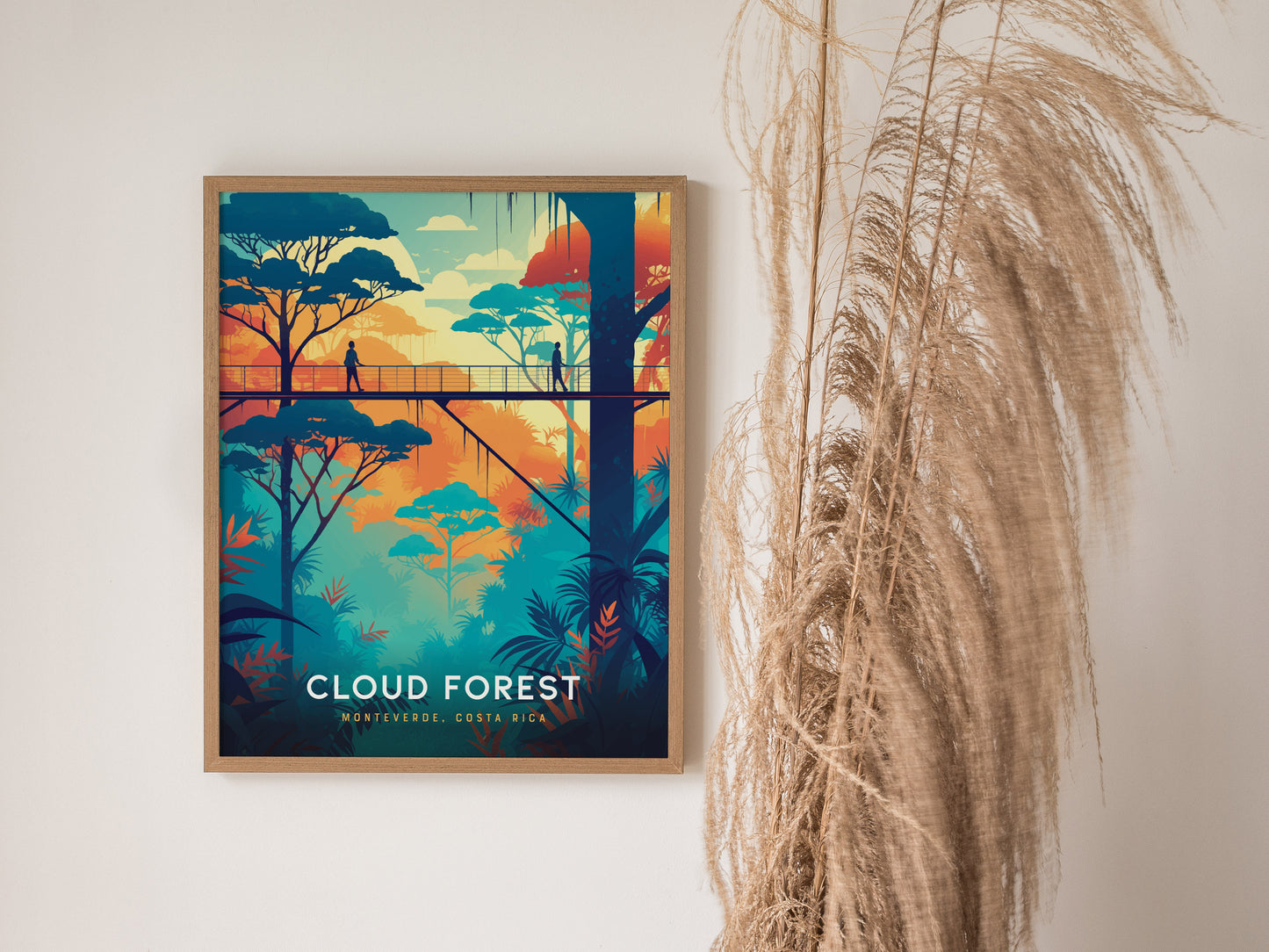 A colorful poster of a cloud forest shows a person walking on a canopy walkway surrounded by vibrant trees. It hangs on a wall next to decorative dried grasses.