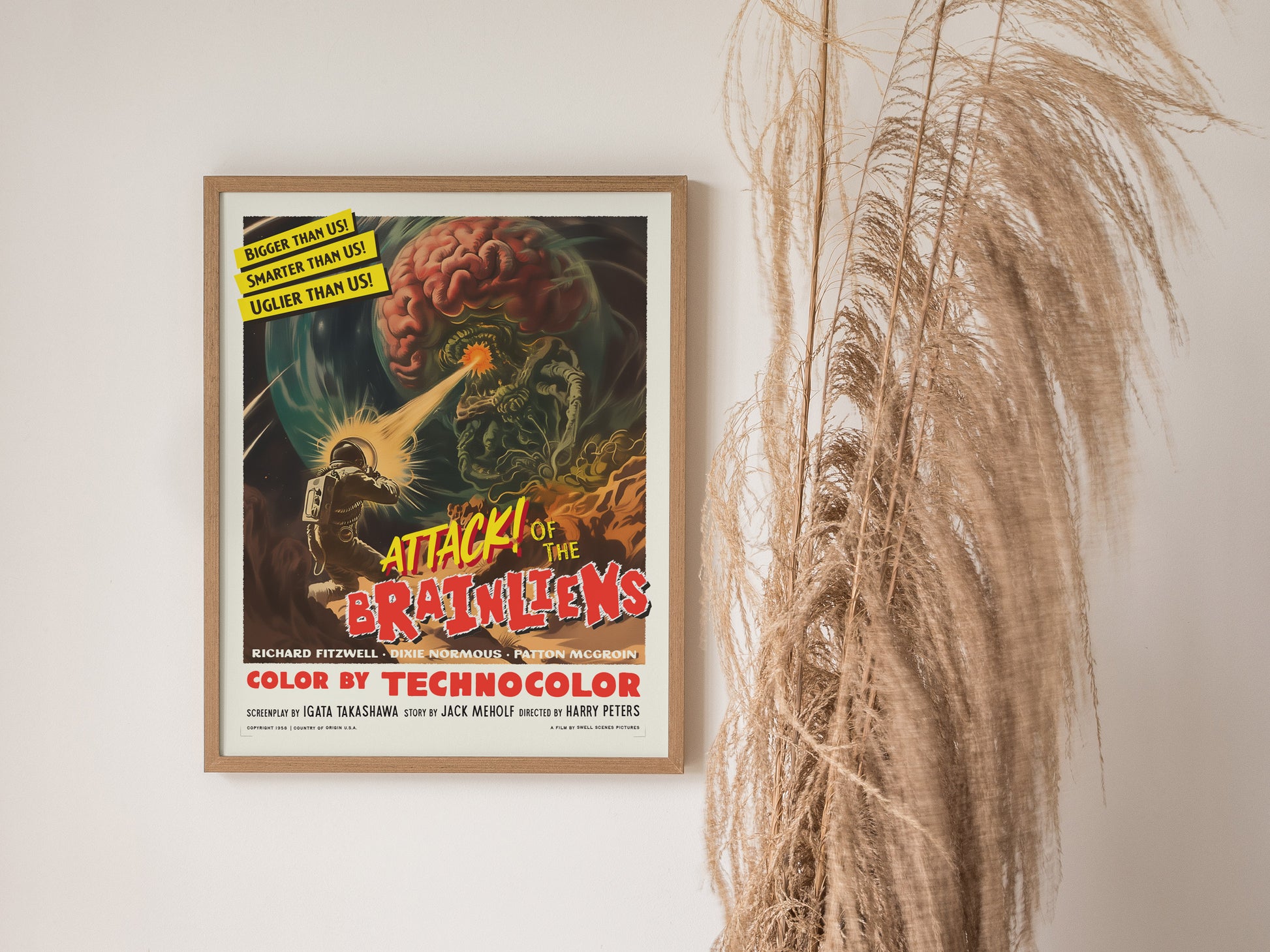 Home setting displaying framed and unframed wall art posters depicting alien chaos and retro sci-fi elements.