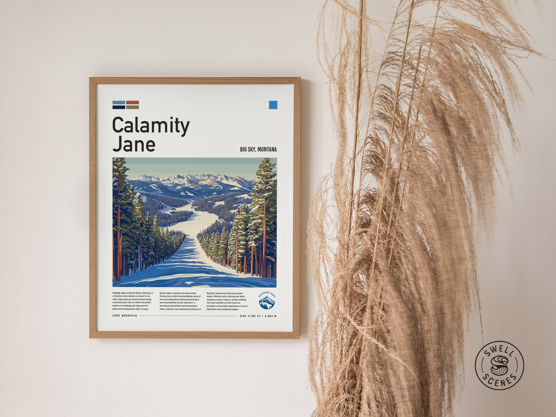 Framed artwork of the Calamity Jane ski run at Big Sky, Montana, featuring a snow-covered path surrounded by pine trees. Decorated space includes dried grasses and Swell Scenes logo.