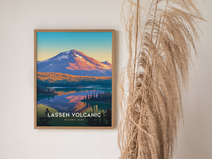 A framed poster of Lassen Volcanic National Park features a colorful depiction of a mountain landscape, complemented by tall, dried grasses on the right.