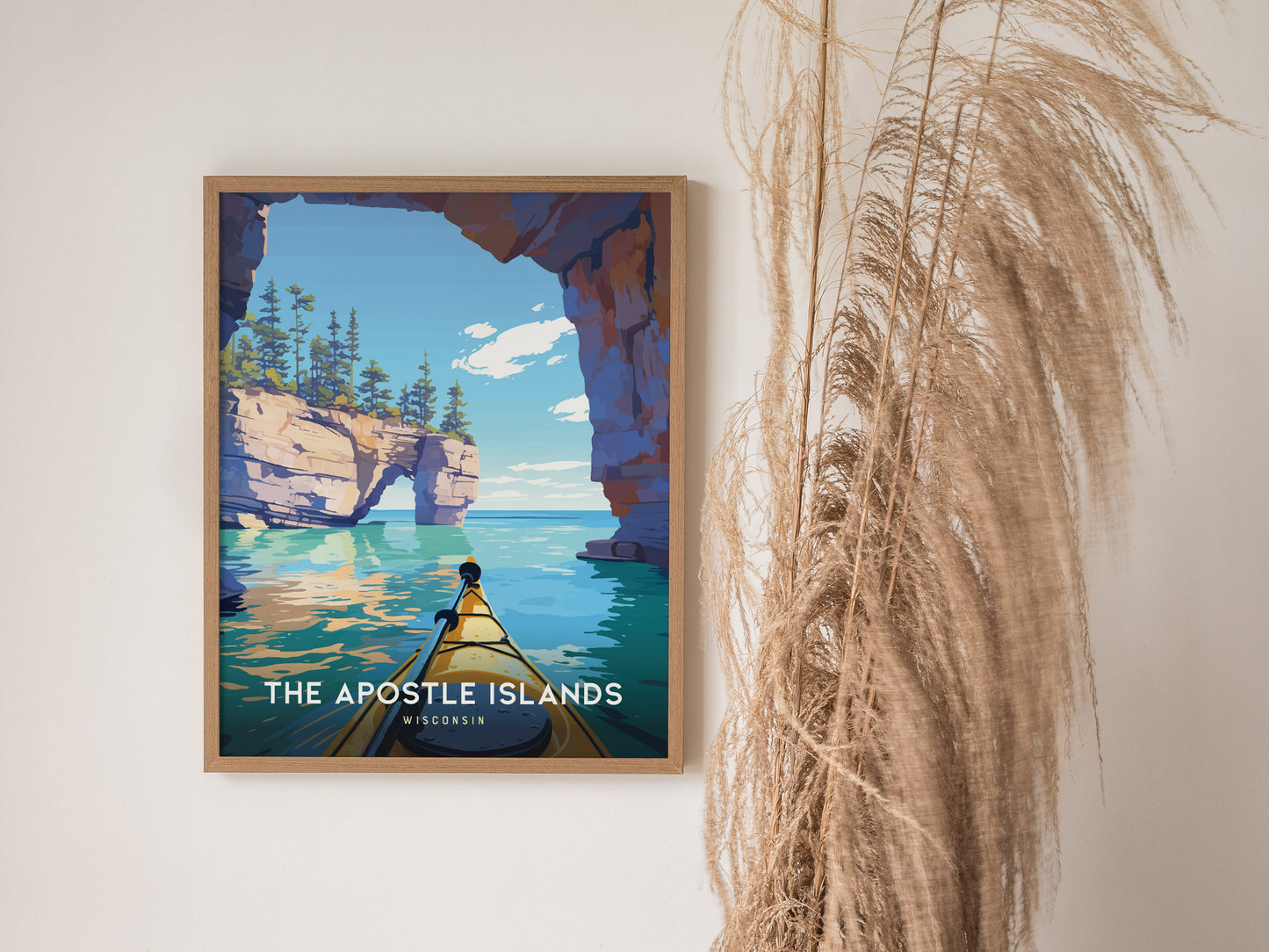 Framed Apostle Islands kayak adventure poster with vibrant blues, a yellow kayak, and rock formations, perfect travel art for nature lovers.