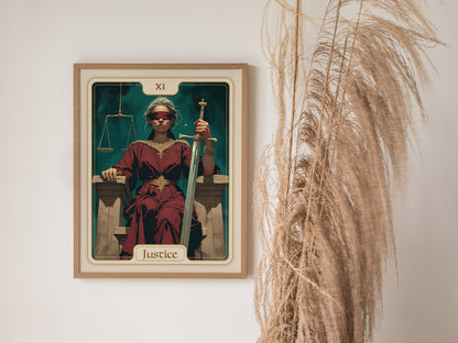 A framed poster of the Justice Tarot card features a seated figure wearing a blindfold, holding a double-edged sword in one hand and scales in the other, set against a dark backdrop.