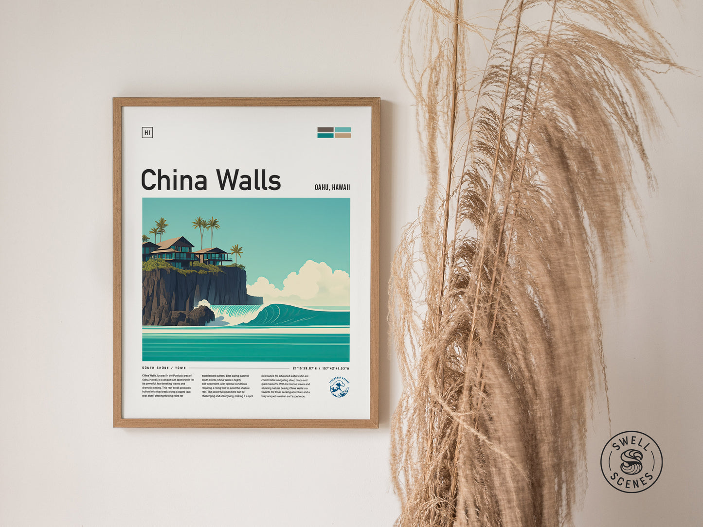 Framed poster titled China Walls depicts a coastal scene with turquoise waves, rocky cliffs, and palm trees. Displayed on a wall beside tall.
