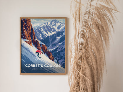 A framed poster on a wall features a snowboarder descending a snow-covered slope with rugged mountains in the background. Tall dried grasses are positioned beside the artwork.
