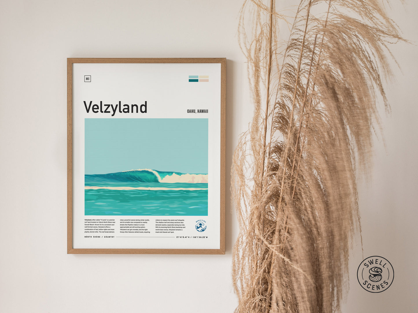 A framed Velzyland poster depicting turquoise waves is displayed on a wall next to tall, dried grasses. The Swell Scenes logo is visible in the corner.