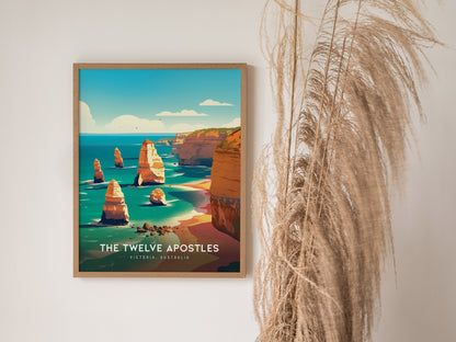 A framed poster of the Twelve Apostles, featuring limestone stacks against a vibrant ocean and sky, hangs on a wall beside tall.