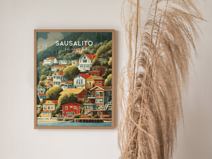 Framed vintage Sausalito, California poster featuring colorful hillside houses, lush greenery, and a tranquil coastal scene.