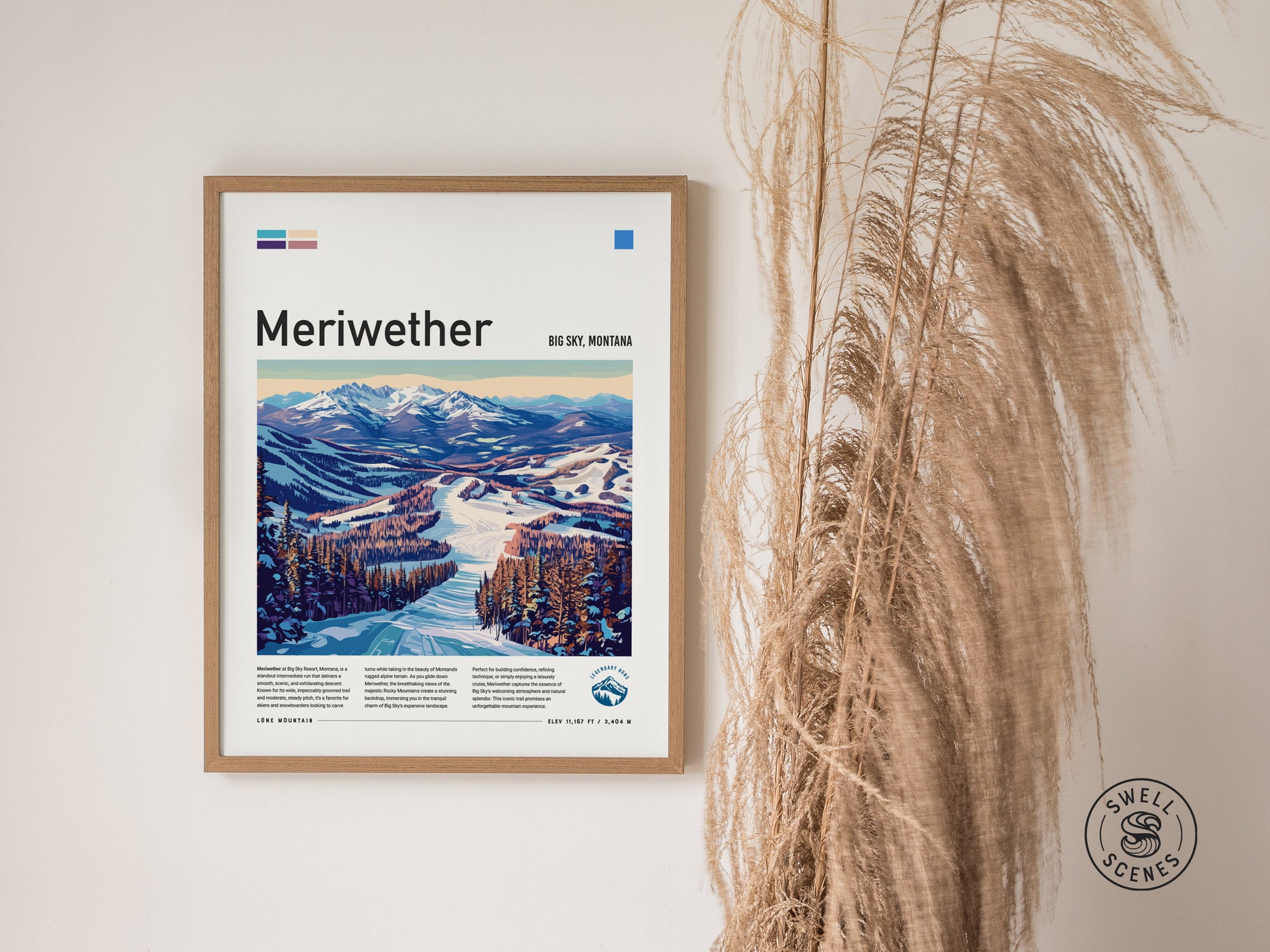 Framed Meriwether Ski Run poster featuring a scenic snowy landscape beneath mountains, hung on a white wall with tall dried grasses beside it. The Swell Scenes logo is visible.