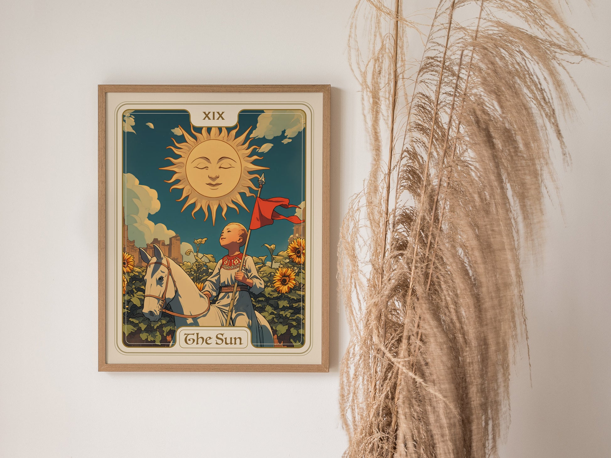 A framed tarot card poster titled The Sun depicts a child on a white horse with sunflowers and a radiant sun above. Pampas grass decorates the right side.
