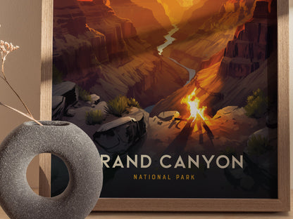 A framed poster of the Grand Canyon shows a vibrant sunset casting light on the canyons layers. A decorative round stone vase with dried flowers is in the foreground.