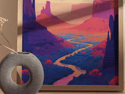 A vibrant poster features a winding river through a dramatic red rock desert landscape, with towering buttes under a colorful sky. A textured, round vase sits nearby.
