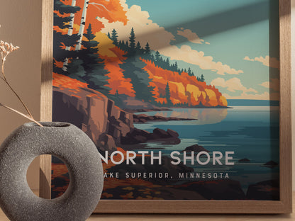 A colorful poster featuring the North Shore of Lake Superior, Minnesota, showcasing vibrant autumn foliage along rocky cliffs and a serene lake.
