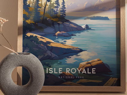 A framed poster of Isle Royale National Park showcases rocky shorelines and serene blue water, with a modern vase in the foreground.