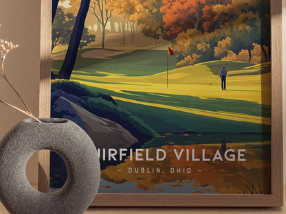 A framed illustration of a golfer on a vibrant autumn golf course at Muirfield Village, Dublin, Ohio, with colorful trees and a clear sky.