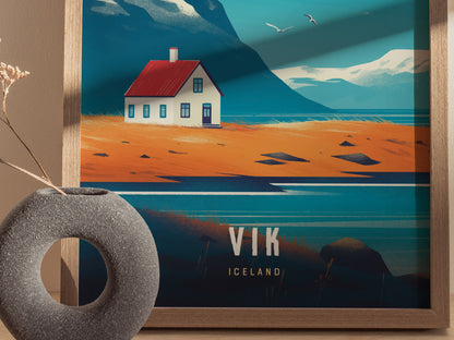 A framed illustration depicts a house with a red roof on a vibrant landscape of orange fields and blue mountains, with the text Vik Iceland.