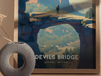 A framed poster of Devils Bridge in Sedona, Arizona, featuring a hiker standing on the natural sandstone arch, surrounded by vivid desert landscapes and rugged cliffs.
