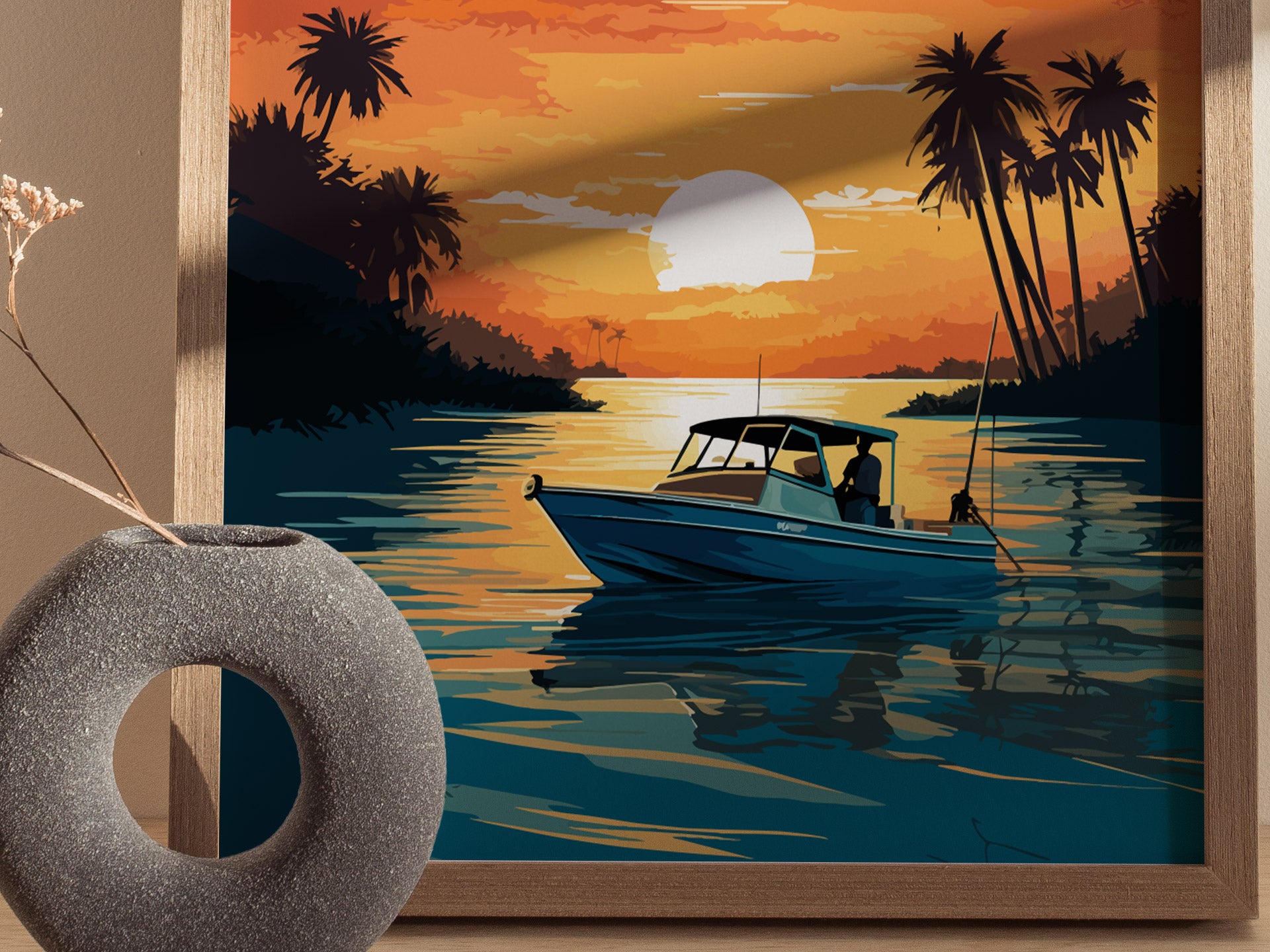 A framed poster depicts a fishing boat on calm water during a vibrant sunset, surrounded by silhouetted palm trees. A decorative vase is positioned in front of the artwork.