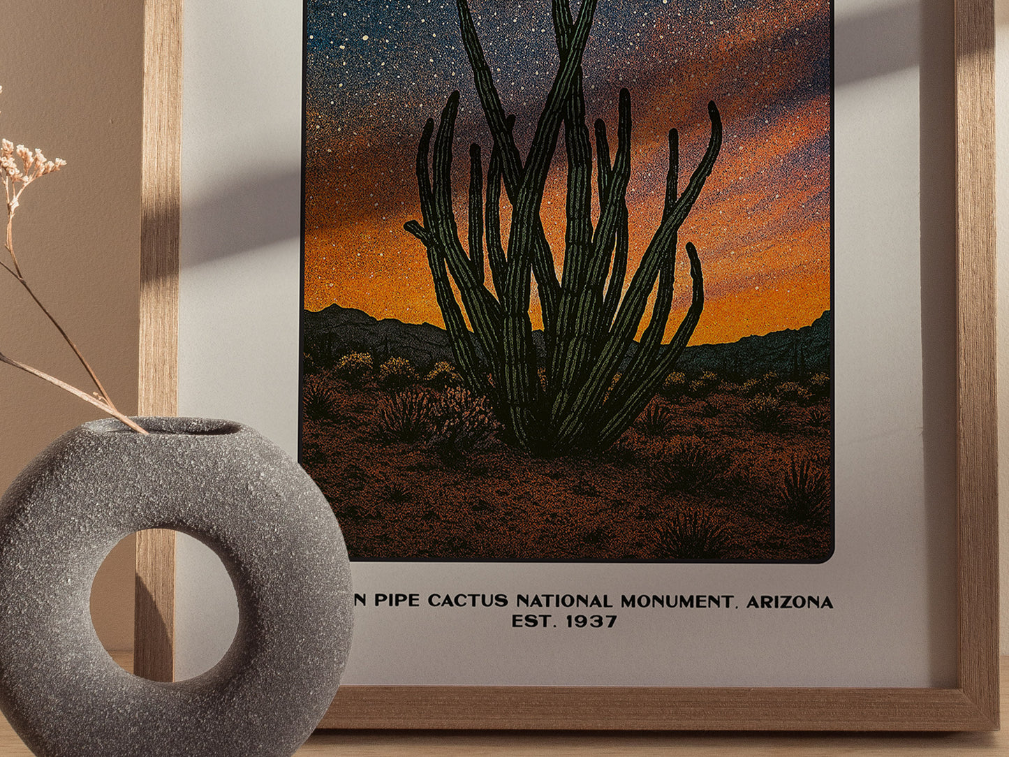 Close up of Organ Pipe Cactus poster showing tall cactus stems silhouetted against a sunset sky