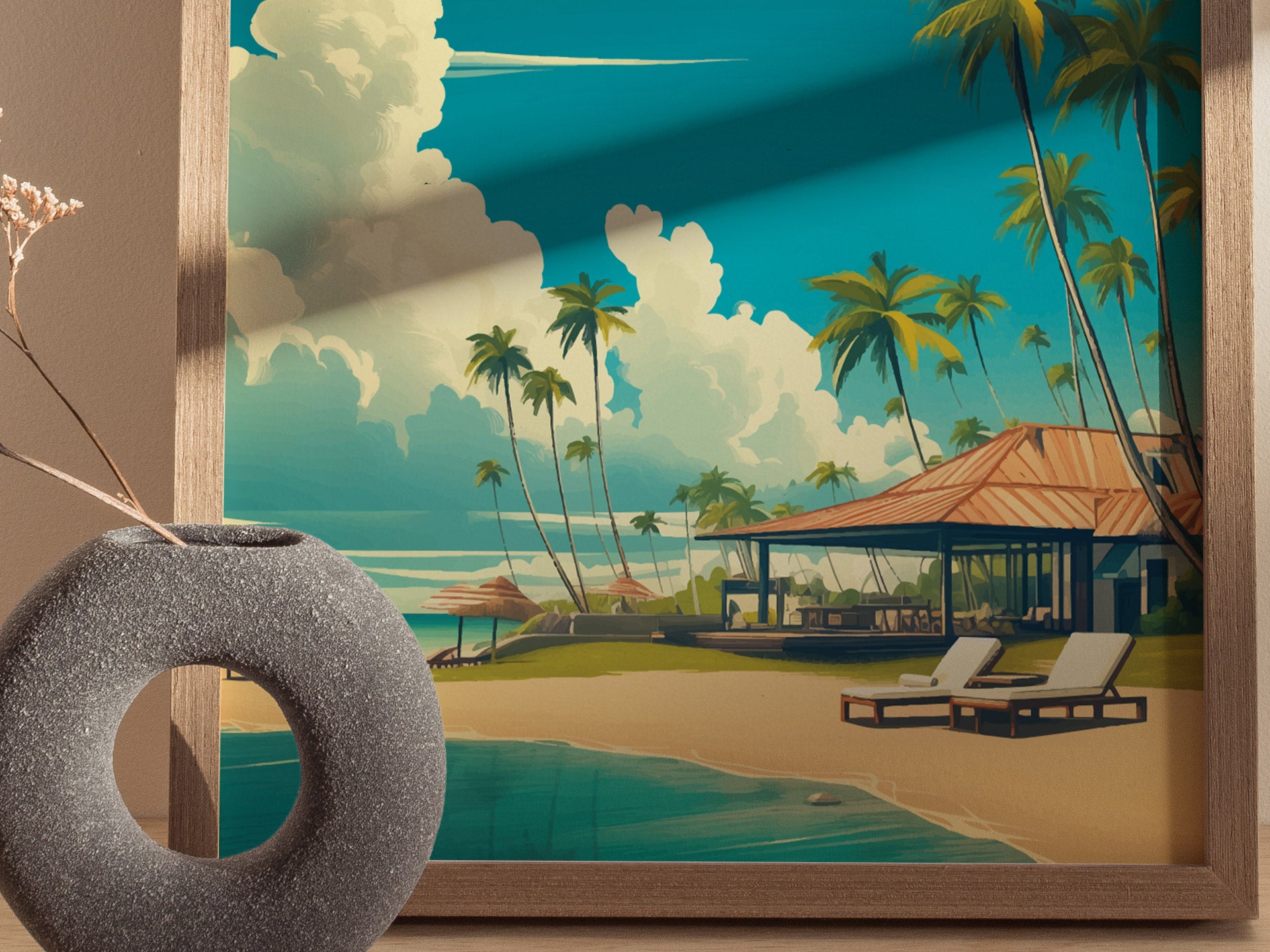 A framed artwork depicts a serene tropical beach scene with palm trees, a thatched-roof building, and lounge chairs by the turquoise water. In the foreground, a textured, circular gray vase holds a single dried flower.