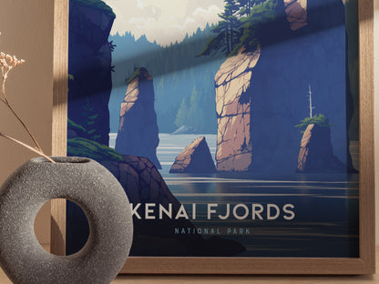 A framed poster of Kenai Fjords National Park features stylized rocky cliffs and a calm fjord, with a minimalist gray vase in the foreground.