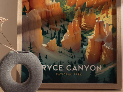 A framed artwork depicting Bryce Canyons vibrant hoodoos in warm orange and red tones is displayed beside a circular, textured vase with dried flowers.