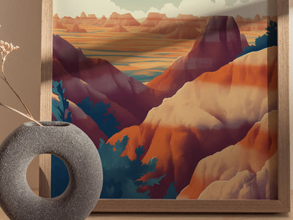 A framed art print depicting a colorful landscape with layered rock formations and rolling hills in vibrant hues. A round, textured vase with dried branches is placed nearby.