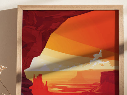 A framed poster depicts a vibrant desert scene with red rock formations and a colorful sunset sky. The art features bold orange and red hues, evoking a dramatic landscape.