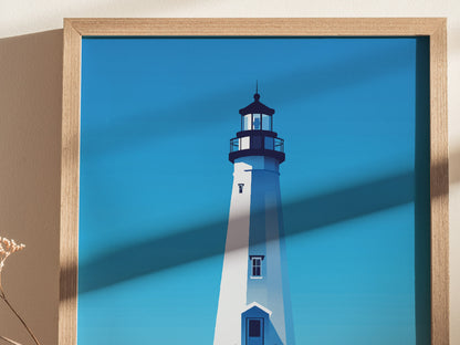 A framed poster depicting the Biloxi Lighthouse against a clear blue sky, featuring modern, bold lines and rich colors. The lighthouse stands tall, symbolizing coastal heritage.