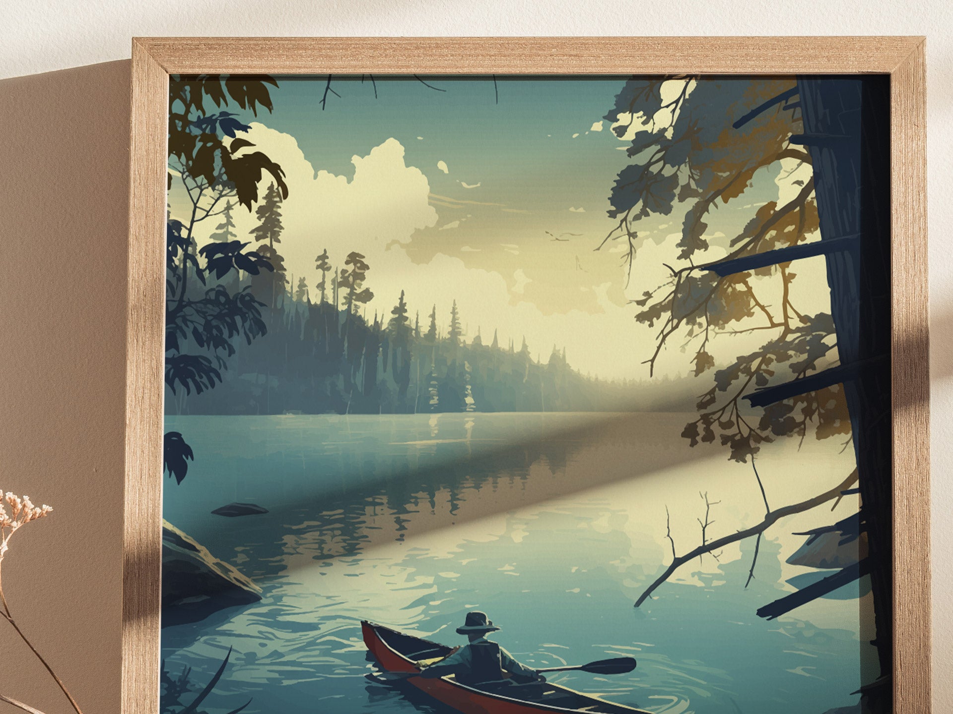 A framed artwork depicts a serene lake scene with a person paddling a canoe under a sky filled with clouds, surrounded by lush forest and calm waters.