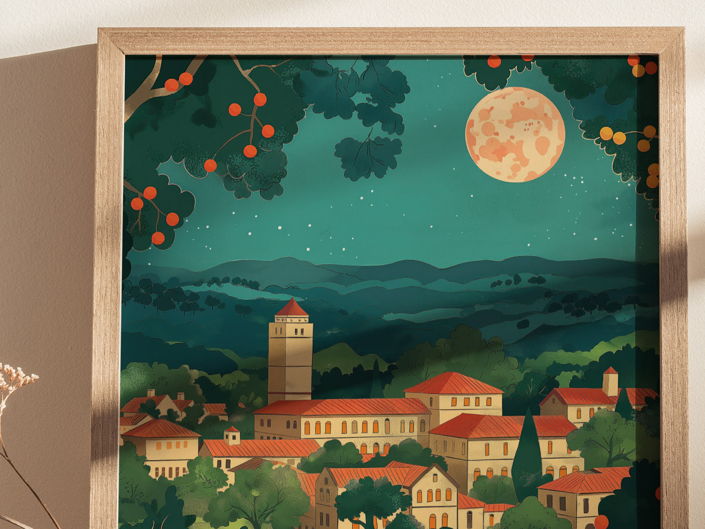 A framed artwork depicts a serene village scene under a starry night sky, featuring a prominent tower, red-roofed buildings, and a large moon illuminating the landscape.