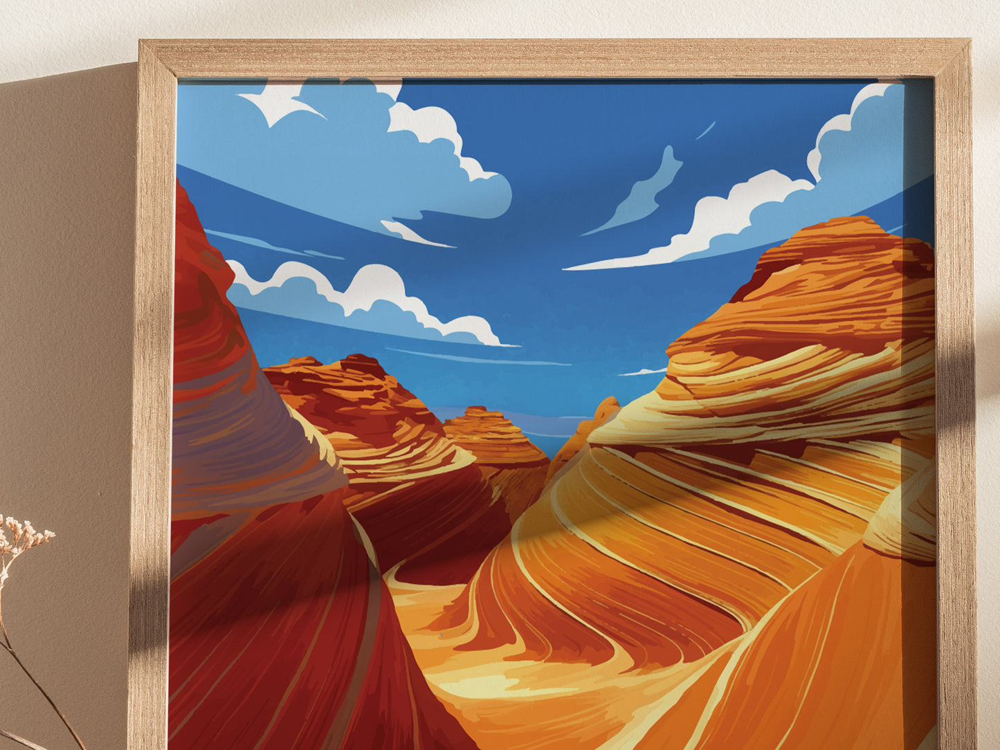 A framed poster depicting vibrant swirling sandstone formations under a bright blue sky with white clouds.