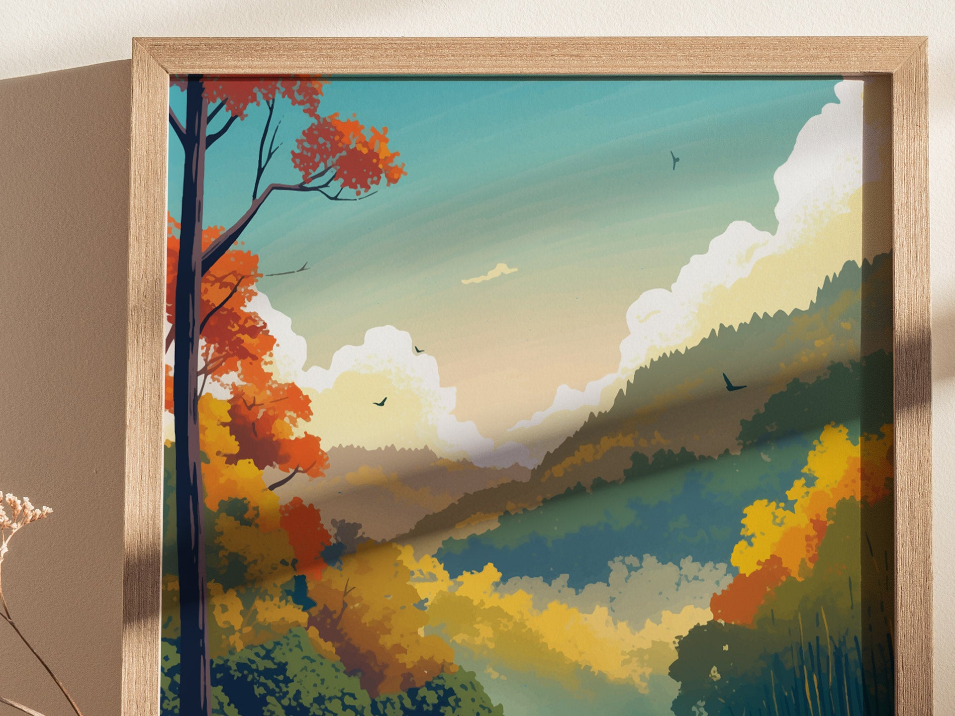 A framed artwork depicting a vibrant landscape with colorful autumn trees, rolling hills, and birds in flight beneath a clear sky. The scene evokes a sense of tranquility.